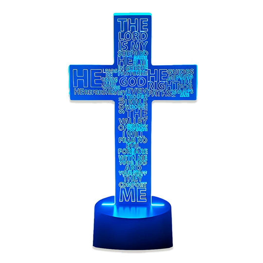 Cruz de acrílico com o Salmo 23 gravado, acesa em azul sobre fundo branco