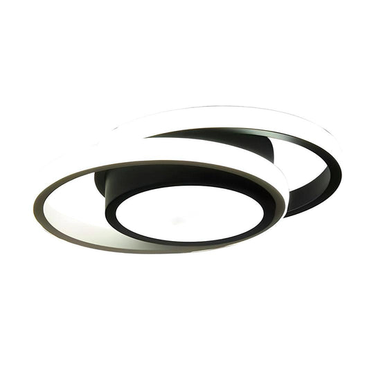 Plafon preto com dois aros sobrepostos e disco central, visto de lado sobre fundo branco