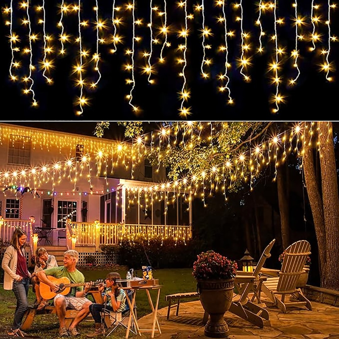 Ambiente · quintal com amigos e a cascata no beiral