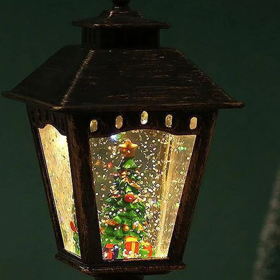 Luz acesa · árvore de Natal na água com glitter dourado
