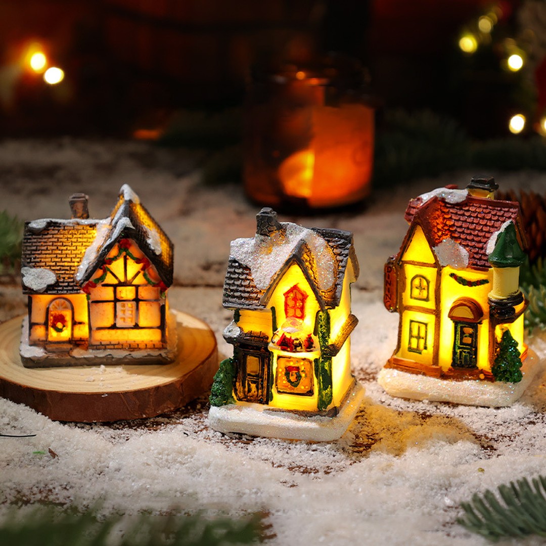 Vila de Natal com casinhas iluminadas na opção 4 casinhas