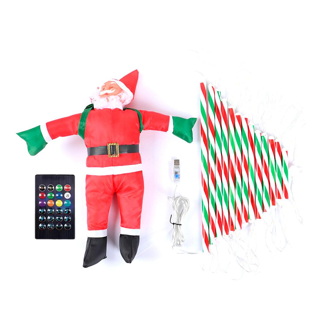 Escada de LED, boneco do Papai Noel, controle remoto e plugue USB sobre fundo branco